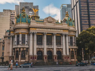a large building with a gold and blue roof